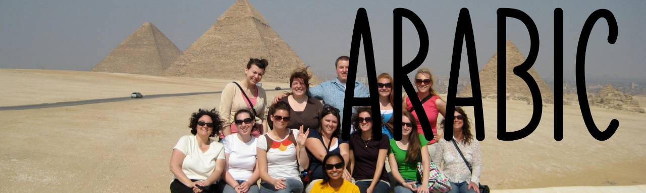 Arabic and students on study abroad in front of pyramids